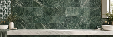 Green marble wall tile with a coordinating geometric mosaic accent