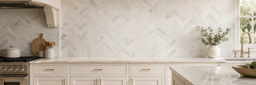 White marble herringbone kitchen backsplash tile