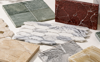 New natural stone tile arrivals featuring green, red, white, gray and beige marble, honey onyx, geometric mosaics and checkerboard tile.