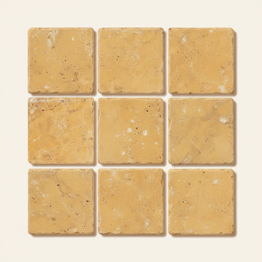 Nine 4x4 tumbled gold yellow travertine tiles arranged in a 3x3 grid