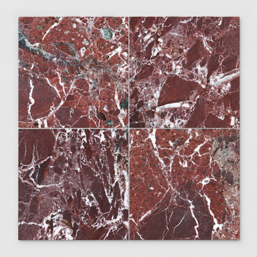 Four Rosso Levanto Breccia Vino 12x12 marble tiles in a 2x2 layout showing natural color and vein variation