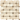 Close-up of ivory travertine octagon mosaic tile sheet with noce dot accents
