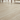 12x24 Ivory Light vein-cut travertine tiles installed on an interior floor