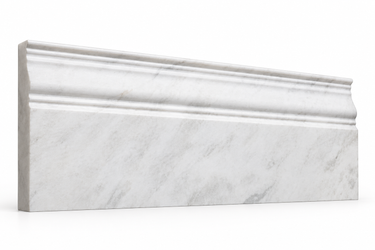 Bianco Congelato dolomite baseboard trim with stepped top ridges and pale gray veining