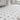 Oriental White octagon marble mosaic with Bardiglio Imperiale dots installed on a bathroom floor