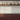 Oriental White 3x6 oxblood kitchen backsplash