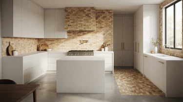 Modern kitchen featuring a sophisticated tiled backsplash and floor section in Mixed Ivory Noce Gold Travertine, showcasing a high-variation blend of cream, walnut brown, and gold tones against minimalist white cabinetry.