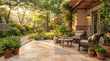 Our Outdoor collection features a cozy suburban patio with natural travertine stone tiles, set in warm afternoon light to make the space feel inviting.