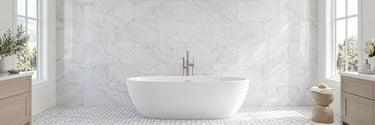 Carrara marble bathroom wall tile with coordinating mosaic floor