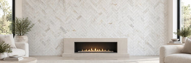 Calacatta Gold marble herringbone mosaic fireplace wall