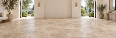 Valencia travertine Versailles pattern floor in a bright Mediterranean interior