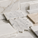 Natural marble tile collection featuring white, gray, beige, brown and green field tiles, mosaics and checkerboard patterns.