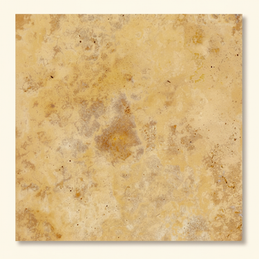 Single 18x18 filled and honed gold yellow travertine tile with natural cloudy variation on a clean studio background