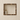 Emperador Dark quarter-round trim around all four sides of a shower niche
