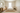 Ivory light travertine 2x2 square mosaic tile in a luxury bathroom setting
