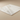 Close-up side angle showing the surface, edge, and thickness of a 12x12 Calacatta Gold marble tile