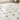 Calacatta Gold marble octagon mosaic with Ming-Green dots installed on a bathroom floor