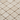 Close-up of ivory light travertine 2x2 square mosaic tile showing natural veining and tumbled finish