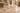 Noce Travertine 4x4 living-room floor application